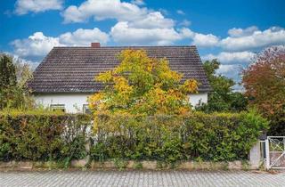 Einfamilienhaus kaufen in 65479 Raunheim, Jung & Kern Immobilien - Einfamilienhaus auf großem Grundstück - mit viel Potenzial