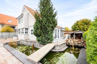Einfamilienhaus kaufen in 85253 Erdweg, Modernes Einfamilienhaus mit eigenem Pool, stilvollem Garten und reichlich Platz für Ihre Fahrzeuge