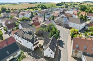 Haus kaufen in 63549 Ronneburg, Zwei Einfamilienhäuser mit ehemaliger Werkstatt und Garage – lohnendes Ensemble in attraktiver Lage