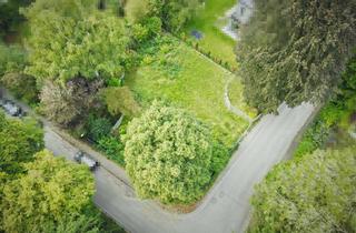 Grundstück zu kaufen in 82049 Pullach, Außergewöhnliches BAUGRUNDSTÜCK mit genehmigter Planung für EFH, Pool und Garage