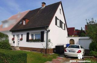 Doppelhaushälfte kaufen in 63773 Goldbach, Goldbach - BERK Immobilien - Siedlungshaus mit Garten und Garage in Goldbach am Kugelberg zu verkaufen