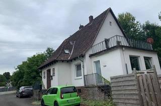 Haus kaufen in 37691 Boffzen, Vermietetes Wohnhaus mit separater Halle in Randlage