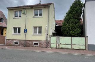 Einfamilienhaus kaufen in 63128 Dietzenbach, Charmantes Einfamilienhaus mit großem Potenzial – ideal für Handwerker und Selbermacher!