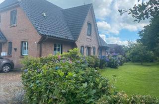 Haus kaufen in 25872 Ostenfeld, Ostenfeld (Husum) - Zweifamilienhaus im Friesenstil
