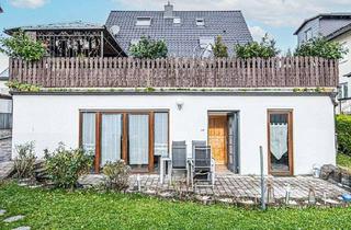 Wohnung kaufen in 61130 Nidderau, Souterrainwohnung mit Gartennutzung in Heldenbergen