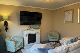 Mehrfamilienhaus kaufen in 26524 Hage, Hage - neu sanierte und barrierefreie 120 m² EG Wohnung am Schulzentrum