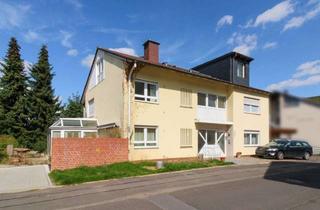Wohnung kaufen in 36364 Bad Salzschlirf, Zweizimmerwohnung mit Stellplatz und Balkon in saniertem Mehrfamilienhaus