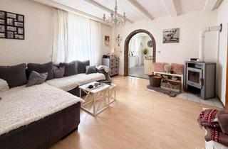 Wohnung kaufen in 86647 Buttenwiesen, Ihr Rückzugsort im Grünen - stilvolle Gartenwohnung mit Raum zum Leben und Barrierefreundlichkeit