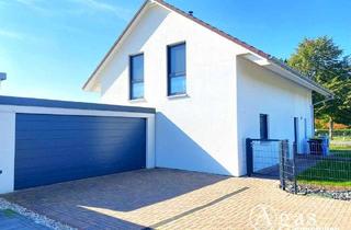 Einfamilienhaus kaufen in 04509 Löbnitz, Modernes Einfamilienhaus mit Garage und großem Garten in Seenähe