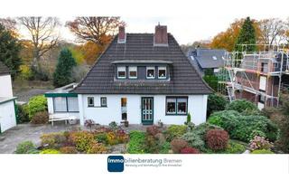 Einfamilienhaus kaufen in 27721 Ritterhude, Charmantes Einfamilienhaus auf attraktiven Hanggrundstück mit Carport