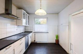 Einfamilienhaus kaufen in 25379 Herzhorn, Einfamilienhaus mit 109 m² Wohnfläche, großem Grundstück und modernisierten Fenstern