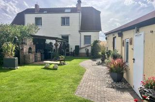 Doppelhaushälfte kaufen in 14712 Rathenow, Hochwertig ausgestattete Doppelhaushälfte mit schönem Garten und bester Lage