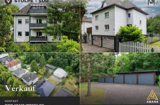 Anlageobjekt in 16761 Hennigsdorf, Investor oder Eigennutzer: Vielseitiges Dreiparteienhaus mit 6 Garagen in Stolpe-Süd