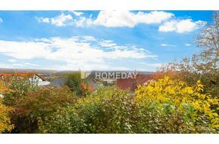 Haus kaufen in 63785 Obernburg, Familienfreundliches EFH in ruhiger Hanglage von Obernburg mit großem Garten und Doppelgarage