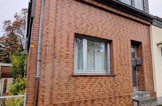 Doppelhaushälfte kaufen in 46149 Buschhausen, Charmante Doppelhaushälfte mit zwei Wohneinheiten in Oberhausen-Buschhausen