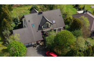 Einfamilienhaus kaufen in 57584 Wallmenroth, Exklusives Einfamilienhaus mit großzügigem Wohnkonzept und Naturgarten!