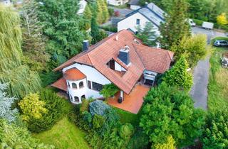 Villa kaufen in 63768 Hösbach, Exklusive Villa mit Indoorpool, Wellnessbereich & traumhaftem Parkgrundstück mit einmaligem Baumbes