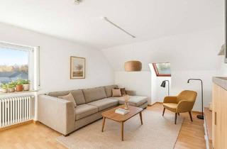 Wohnung kaufen in 85737 Ismaning, Gemütliche 2,5 Zimmer Dachgeschoss-Wohnung mit Südbalkon inkl. Stellplatz