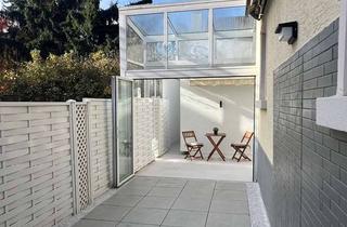 Wohnung kaufen in 76199 Rüppurr, Modernisiert: EG-Wohnung mit Wintergarten, Süd-Terrasse & neuer Technik!