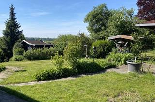 Wohnung kaufen in 83355 Grabenstätt, 4-Zimmer-Eigentumswohnung mit ca. 500 m² Gartenanteil und Bergblick in Grabenstätt am Chiemsee