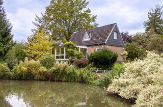 Einfamilienhaus kaufen in 24222 Schwentinental, Idyllisches Einfamilienhaus auf traumhaftem Naturgrundstück mit Teich