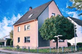 Mehrfamilienhaus kaufen in 40723 Hilden, Attraktives Mehrfamilienhaus mit 3 Wohneinheiten, Gartenterrasse und Garagenhof