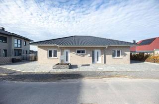 Haus kaufen in 49577 Ankum, Modernes Wohnen auf einer Ebene – hochwertiger Bungalow in Ankum