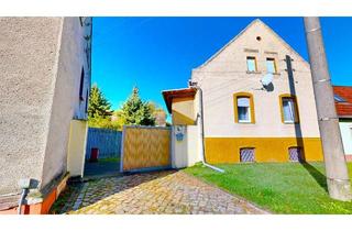 Doppelhaushälfte kaufen in 06780 Zörbig, Aus alt mach neu – ruhig gelegene Doppelhaushälfte mit Ausbauchance und Gartenidylle