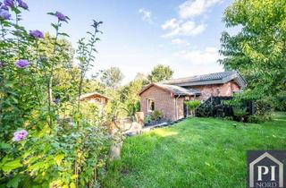 Haus kaufen in 24329 Grebin, Ländlich wohnen, modern genießen - Vier Garagen und großzügiges Grundstück inklusive!