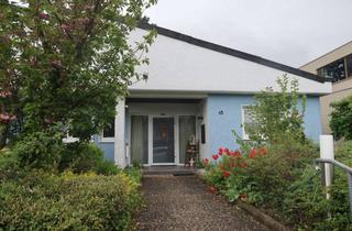 Anlageobjekt in 55270 Jugenheim, Mehrfamilienwohnhaus Anlageobjekt mit zusätzlichem Baugrund zu verkaufen