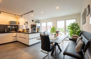 Wohnung kaufen in 85764 Oberschleißheim, Charmante Dachgeschosswohnung mit großem Sonnenbalkon – neuwertig und energieeffizient