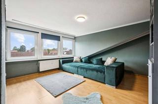 Wohnung kaufen in 31655 Stadthagen, Dachgeschosswohnung in der Innenstadt von Stadthagen mit Altstadtblick