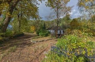 Haus kaufen in 24806 Lohe-Föhrden, Großes Grundstück mit modernisierungsbedürftigem Bungalow in ruhiger Lage nahe Rendsburg