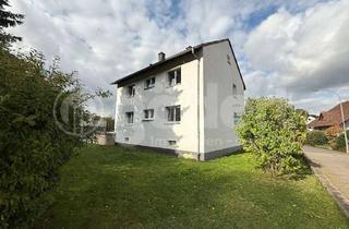 Haus kaufen in 63785 Obernburg, Zweifamilienhaus mit Garten und zwei Garagen