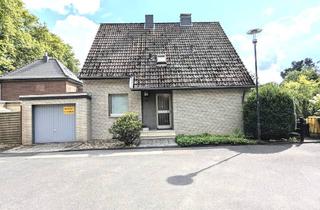 Einfamilienhaus kaufen in 41516 Grevenbroich, Perfekt für Ihre Familie: Freistehendes EFH mit Keller, Garage und Garten in ruhiger Waldrand-Lage