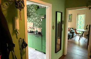 Wohnung kaufen in 26817 Rhauderfehn, Charmante Erdgeschosswohnung mit Terrasse in ruhiger Lage von Rhauderfehn