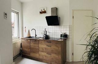 Wohnung kaufen in 65462 Ginsheim-Gustavsburg, Attraktive Dachgeschosswohnung in Ginsheim-Gustavsburg für junge Familien oder Paare