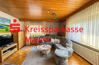Wohnung kaufen in 56626 Andernach, Charmante Erdgeschosswohnung mit Terrasse, Garage und Kamin
