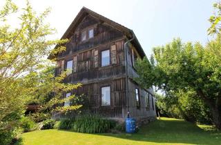 Haus kaufen in 36119 Neuhof, Wohnhaus in Rommerz mit gepflegtem Garten und schönem Panoramaausblick auf die Rhön