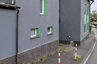 Mehrfamilienhaus kaufen in 56337 Eitelborn, Mehrfamilienhaus mit Garage und viel Potenzial!