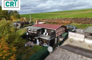 Einfamilienhaus kaufen in 36326 Antrifttal, Einfamilienhaus in idyllischer Ruhelage – Wohnen, wo andere Urlaub machen