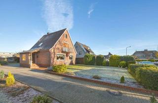 Einfamilienhaus kaufen in 21629 Neu Wulmstorf, Solides Einfamilienhaus mit Vollkeller und Doppelgarage in begehrter Lage