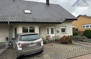 Doppelhaushälfte kaufen in 32602 Vlotho, Geräumige, unterkellerte Doppelhaushälfte in Vlotho - Holzmann Immobilien