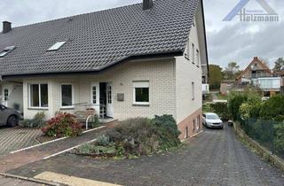 Doppelhaushälfte kaufen in 32602 Vlotho, Geräumige, unterkellerte Doppelhaushälfte in Vlotho - Holzmann Immobilien