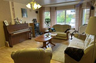 Doppelhaushälfte kaufen in 32602 Vlotho, Geräumige, unterkellerte Doppelhaushälfte in Vlotho - Holzmann Immobilien