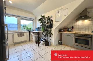 Wohnung kaufen in 32457 Porta Westfalica, Vermietete 2- Zimmer- Dachgeschosswohnung mit Süd- Balkon und Garage