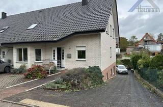 Doppelhaushälfte kaufen in 32602 Vlotho, Geräumige, unterkellerte Doppelhaushälfte in Vlotho - Holzmann Immobilien