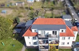 Wohnung kaufen in 04442 Zwenkau, Charmante 2,5-Zimmer-Dachgeschosswohnung mit Balkon in Zwenkau