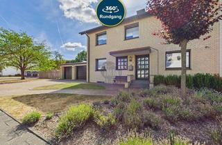 Haus kaufen in 33442 Herzebrock-Clarholz, Massiv gebautes Zweifamilienhaus mit Kamin, Balkon & liebevollem Garten