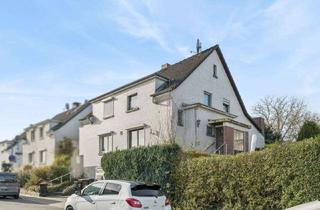 Doppelhaushälfte kaufen in 42553 Velbert, Charmante Doppelhaushälfte mit Garten, Kaminofen und Ausbaupotenzial in Velbert-Neviges